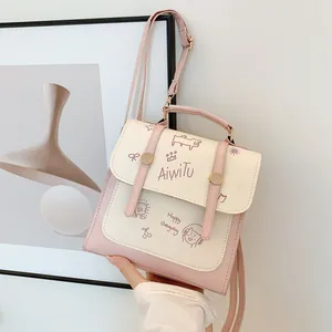 Zaino da donna minimalista rosa e beige con illustrazioni a fumetti e manico superiore