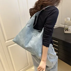 Minimalist grey-blue faux leather tote bag with vintage texture for daily casual use