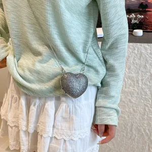 Sparkling silver heart-shaped crossbody bag with metal chain strap for women party fashion