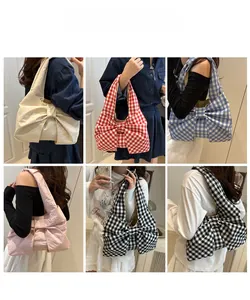 Collage of large bow shoulder bags showing various colors and plaid patterns on models