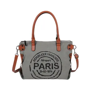 Vintage gray canvas tote bag with brown leather handles and French Paris letter print