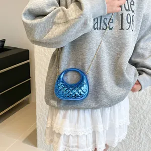 Glossy blue quilted crescent bag with gold chain strap for women fashion
