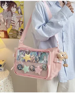 Pink canvas Ita bag with large clear display window for anime badges and plush charms