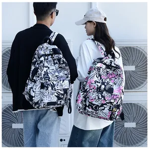 Detail view of stylish graffiti backpacks with slogans on durable fabric for students
