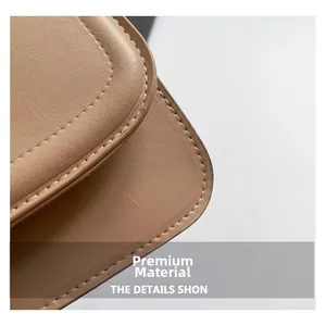 Macro detail of high-quality light khaki faux leather texture with precision stitching