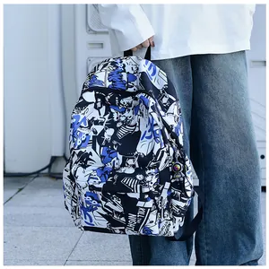 Detail showing cartoon graffiti prints and astronaut pendant on the campus backpack