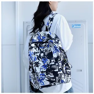 Detail view of graffiti pattern canvas backpack with street style print and durable strap
