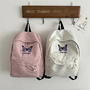 Cute large capacity school backpack for girls with purple butterfly embroidery and dreams print