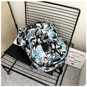 Close-up of student backpack with graffiti print on industrial chair background