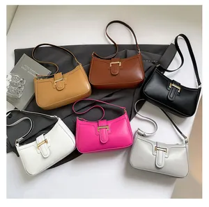 Flat lay of retro crescent crescent shoulder bags in six vibrant assorted colors