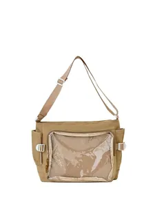 Khaki messenger bag detail showing transparent PVC window with honeycomb mesh pocket