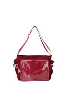 Close-up of deep red student shoulder bag featuring a clear front window for display
