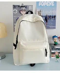 Close-up of cream nylon backpack with front zipper pocket and minimalist design details