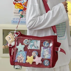 Red canvas ita bag with large clear PVC window and cute plush star charm for students