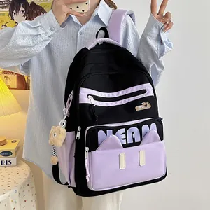 Minimalist black and purple laptop backpack with cute cat ear pockets and bear pendant