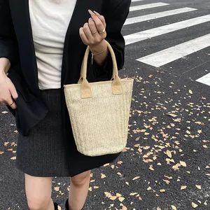 Large capacity stylish straw tote bag for women featuring a woven bucket design
