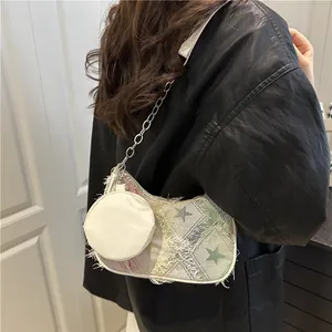 Borsa sottobraccio retrò in denim patchwork con stelle, catena argento e borsellino
