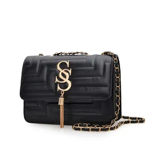 Classic black quilted square shoulder bag with gold chain strap and elegant tassel detail