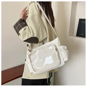 Borsa a tracolla in tela bianca con tasca a rete trasparente e tracolla regolabile