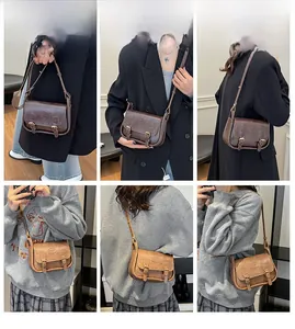 Detailed views of vintage brown PU leather saddle crossbody bag worn by a model