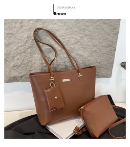 Brown textured leather tote bag set including three pieces with gold hardware details