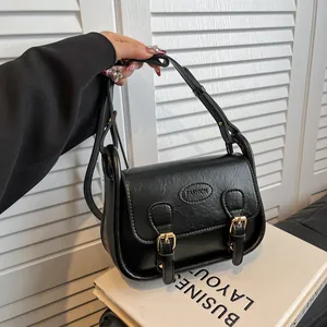 Retro black PU leather saddle bag with fashion engraving and adjustable shoulder straps