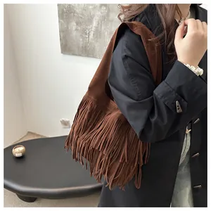 Brown faux suede tote bag with layered fringes and a stylish wide shoulder strap