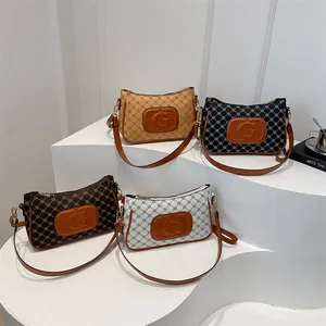 Women's trendy letter crossbody bags in yellow, black, brown, and white colors