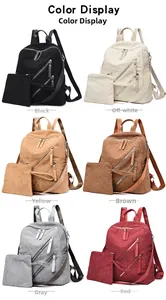 Detail showing various colors of corduroy backpacks with matching small pouches
