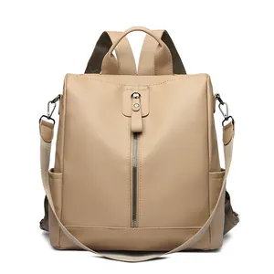 Minimalist beige oxford fabric backpack for women with convertible shoulder straps