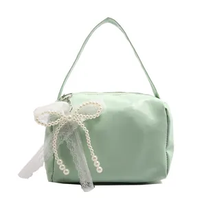 Chic mint green underarm bag with lace bow and pearl charms for women's daily commute