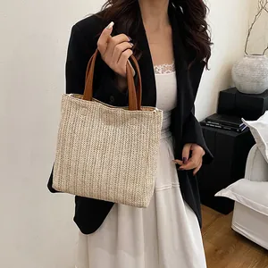 Sac seau en paille minimaliste avec anses en cuir marron et grande capacité