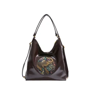Deep coffee vintage leather tote with embossed elephant and floral pattern for women
