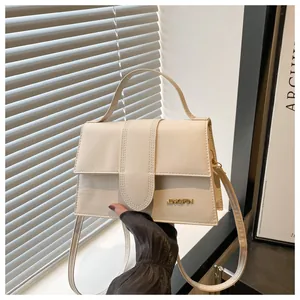 Chic cream white structured crossbody handbag with top handle and gold JINGPIN logo