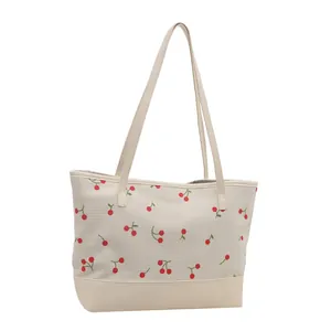 Cream corduroy tote bag with cherry print and leather base for 2025 fashion style