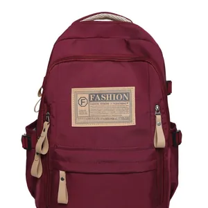 Mochila escolar granate de gran capacidad con etiqueta de moda y nailon resistente