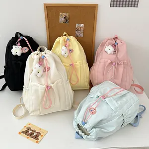 Mochila escolar de colores pastel con cordón y colgante de oso de peluche suave