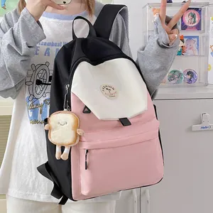 Dreifarbiger Kontrast-Rucksack für Schüler aus wasserdichtem Nylon mit Plüschanhänger