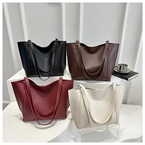 Detailed display of four vintage large capacity tote bags in multiple elegant colors