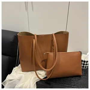 Chic tan faux leather tote bag set including a large shopper and a matching zipper pouch