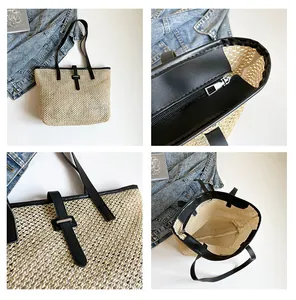Dettaglio della borsa tote in paglia intrecciata con cinturini in pelle nera e zip argento