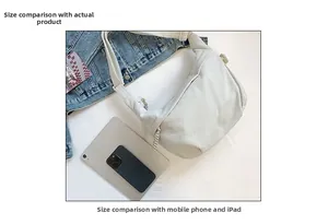 Corduroy crossbody bag size comparison with tablet and phone showing large capacity