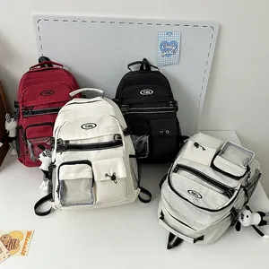 Zaini giapponesi multitasche per studenti in rosso, bianco e nero con ciondolo a coniglio