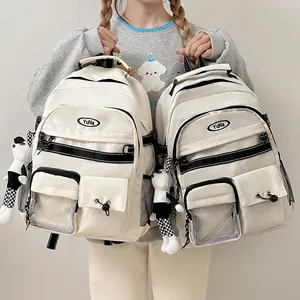 Zaino Harajuku in nylon beige con tasche multifunzionali e ciondolo a forma di panda