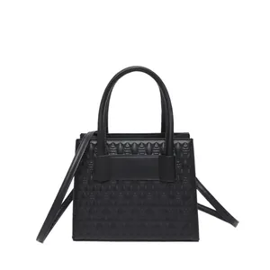 Elegante schwarze Handtasche mit geometrischer Prägung und Schultergurt für Damen