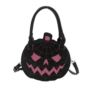 Borsa a zucca di Halloween nera con motivi ragnatela rosa e tracolla regolabile