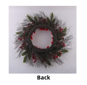 Detail view showing the woven branch back structure of the Christmas red berry wreath