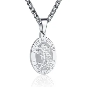Detailed engraving of Saint Michael on stainless steel oval pendant with polished finish