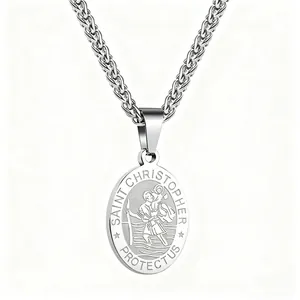 Close-up of Saint Christopher medal on a polished steel chain with detailed engraving