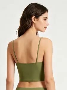 Rear view of olive green seamless camisole showing adjustable thin straps and smooth fabric